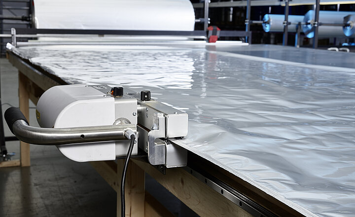 Versiegeln mit Durchlaufsiegelgerät